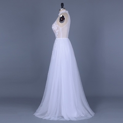 Z bílé sexy průsvitné svatební šaty Nubia