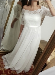 Smetanové svatební šaty s rukávy